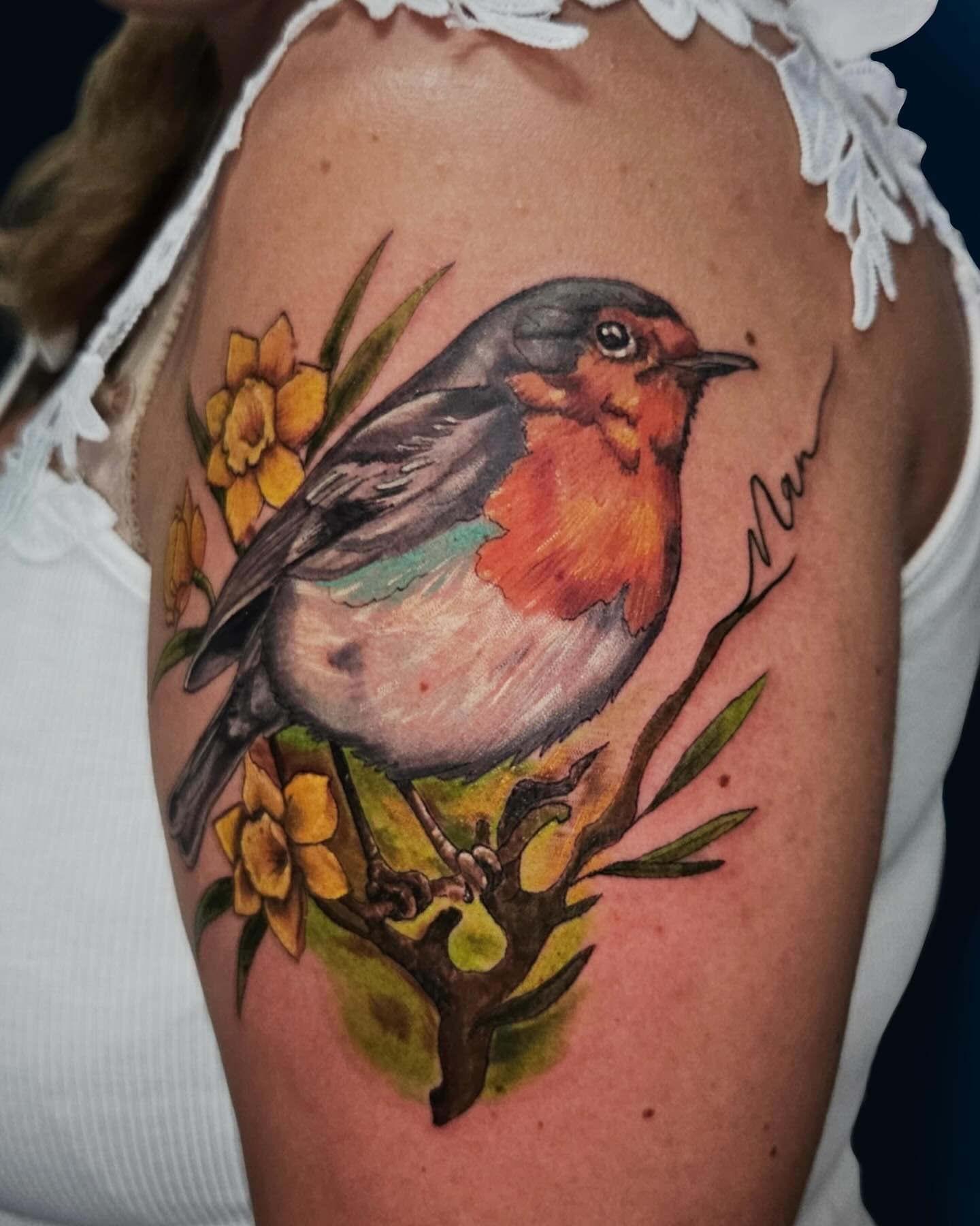 Pájaro con flores